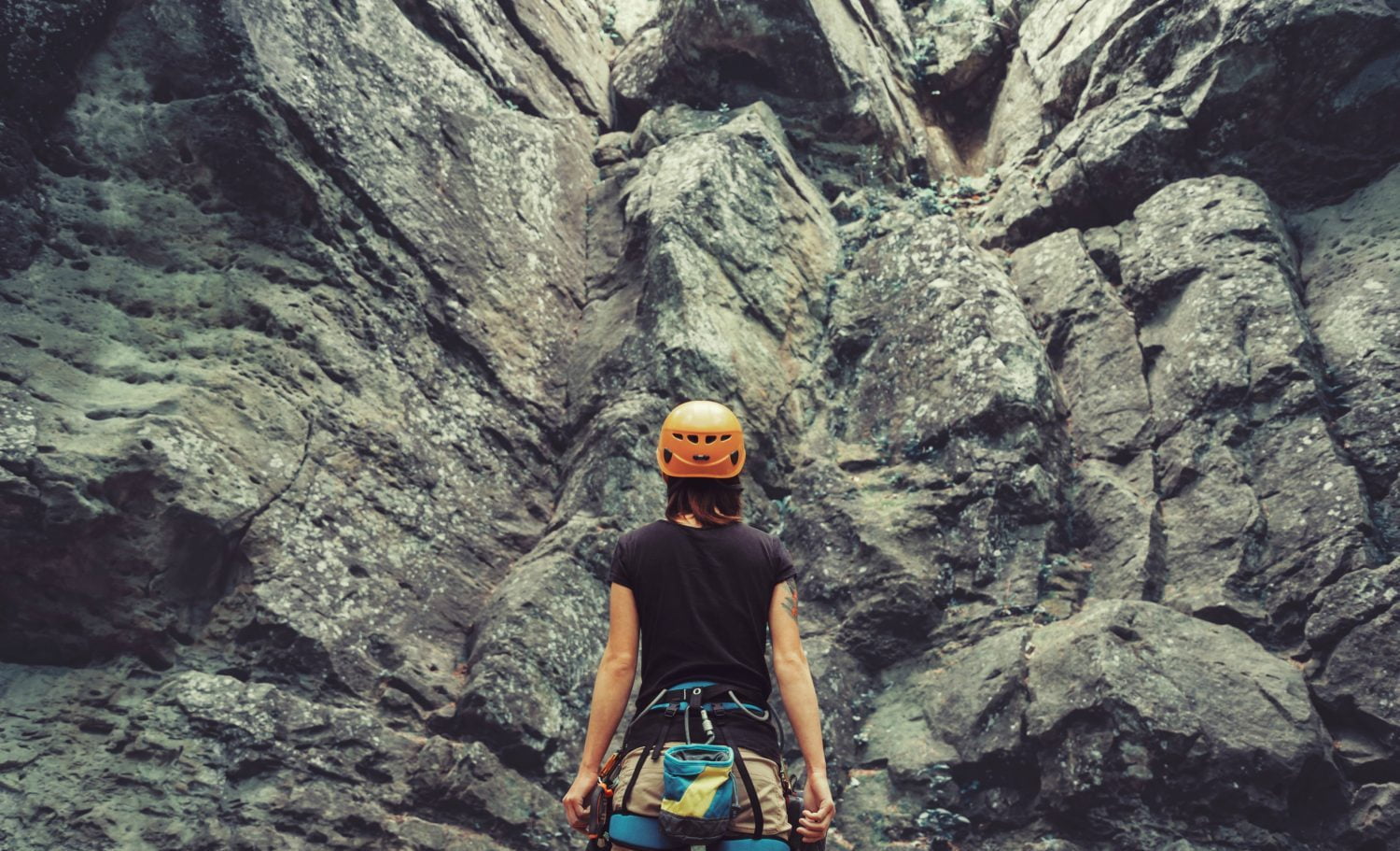 woman getting ready to rock climb