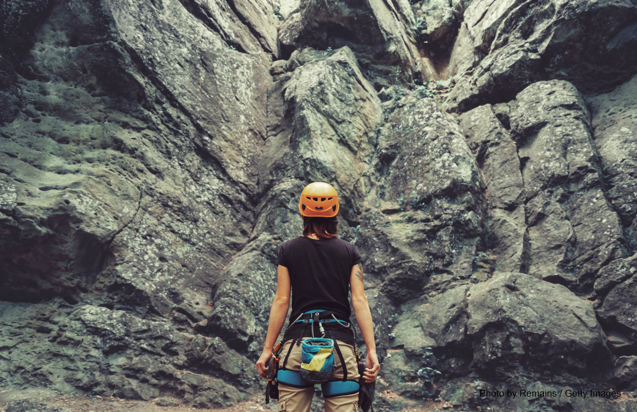 Woman getting ready to rock climb