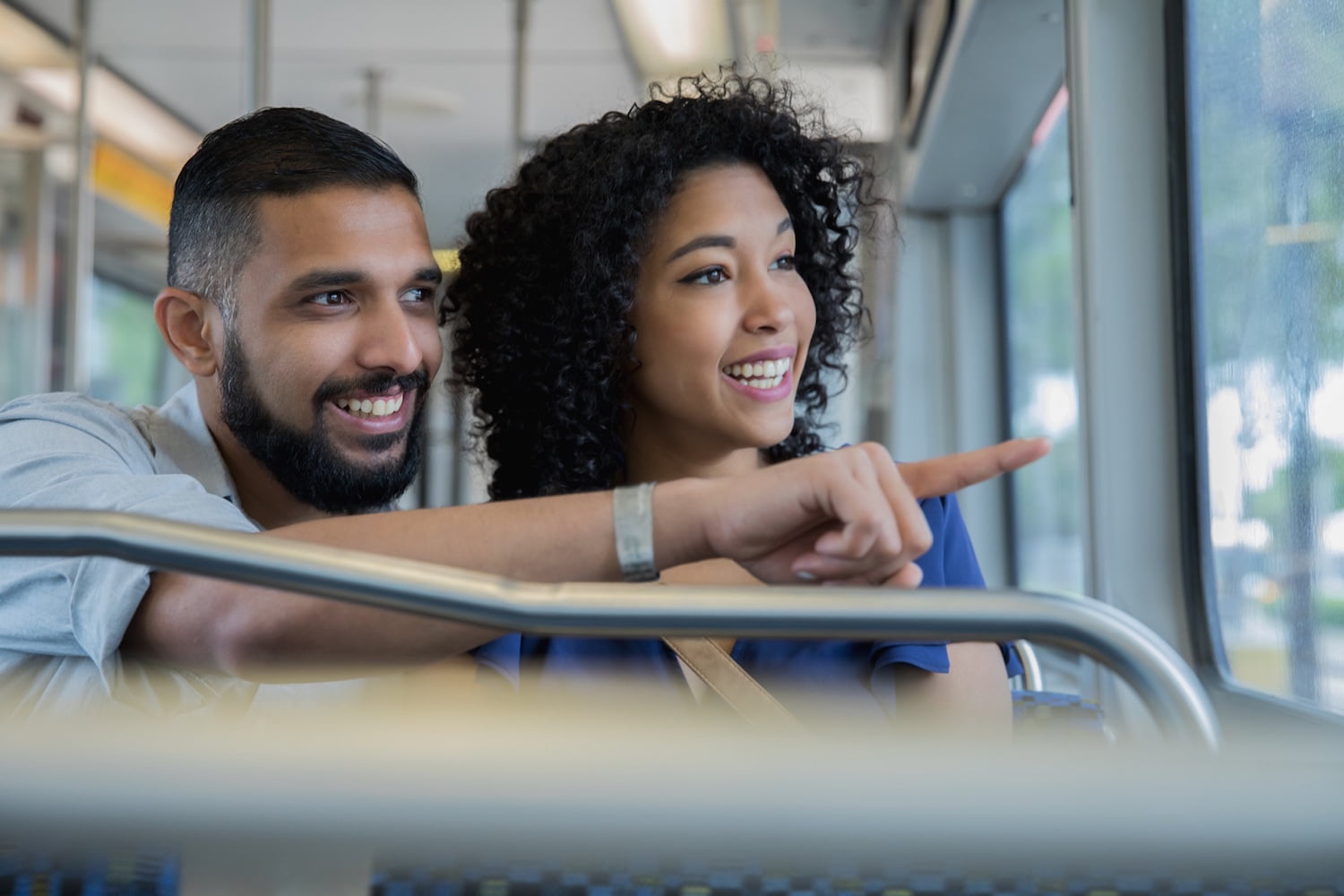 couple looking out of a train window