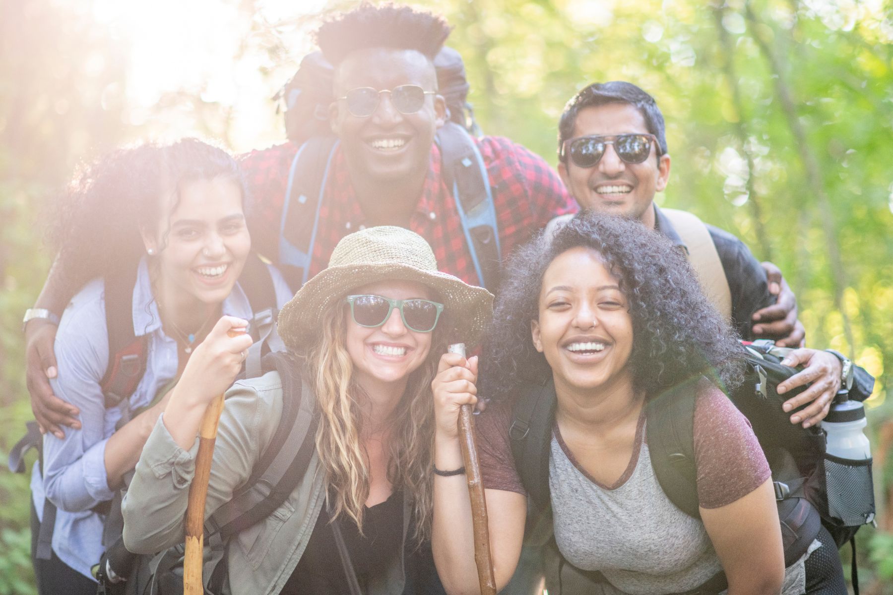 a group of friends enjoying a summer hike