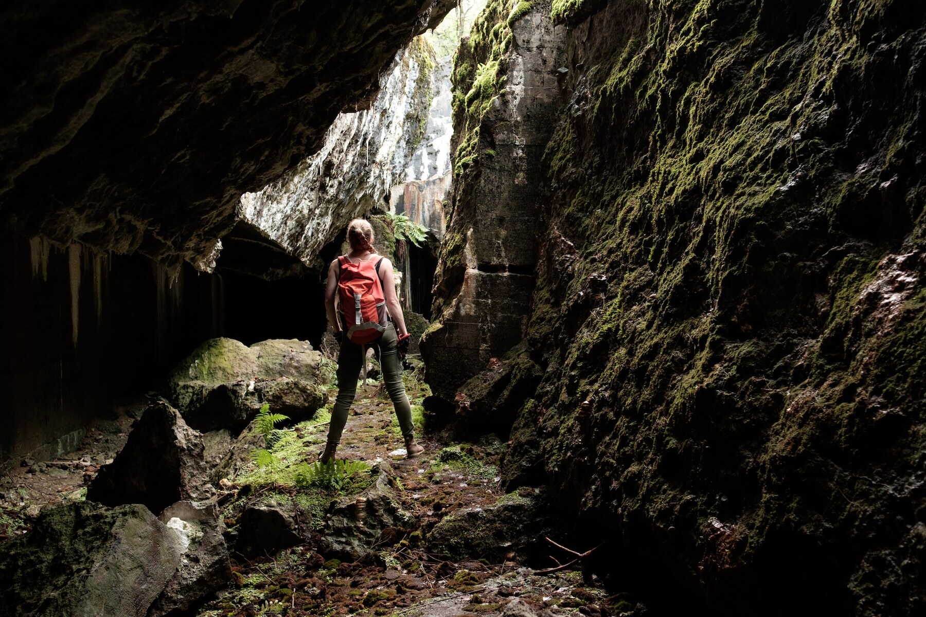 woman spelunking in the Hocking Hills